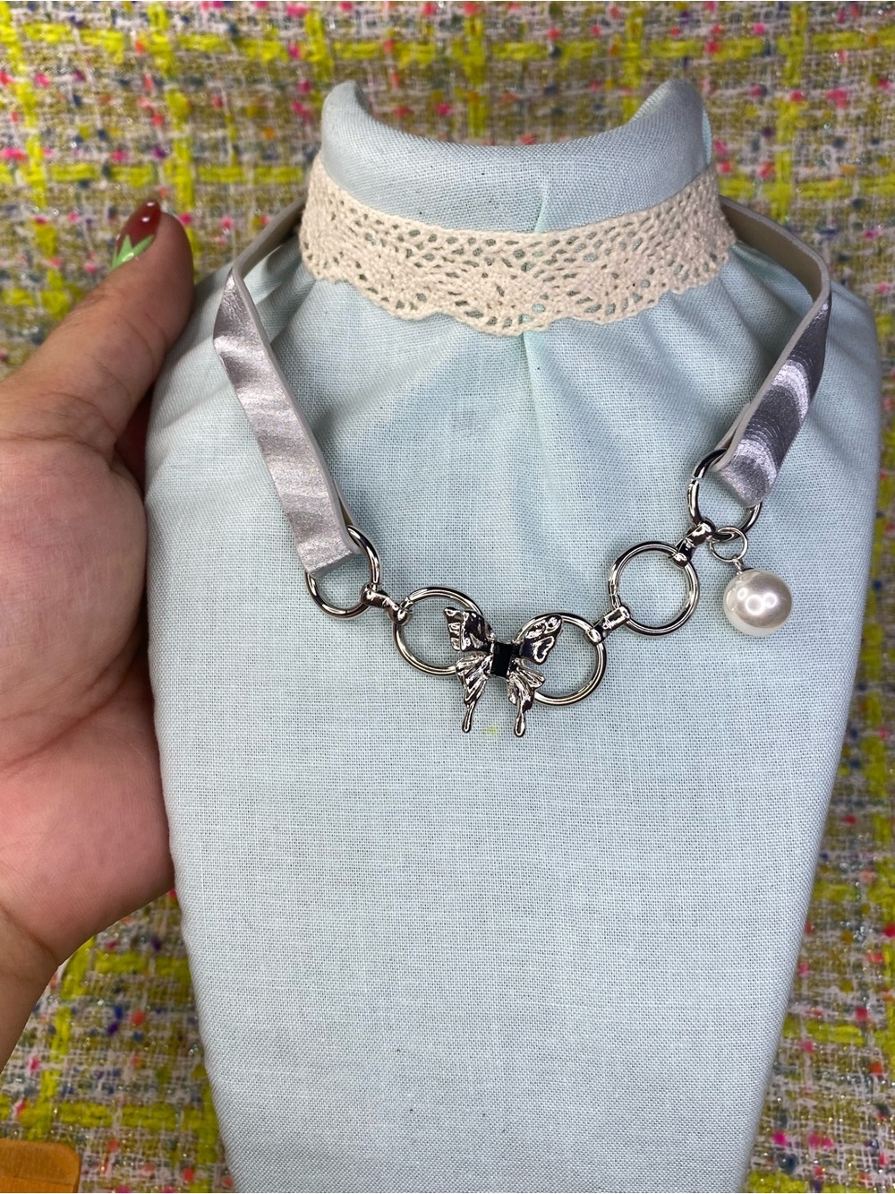 Silver Butterfly Ring-Link Necklace with Gray Ribbon and Pearl Accent